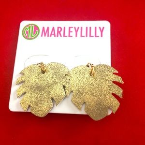 Gold leaf drop earrings.